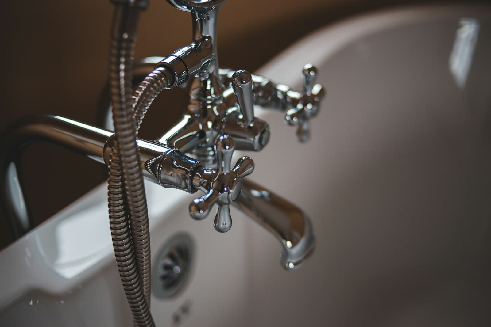 Chrome clawfoot tub faucet and hand shower